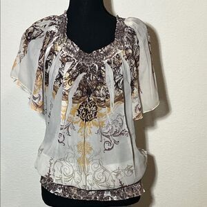 Cato Women's Cream and Brown Ornate Blouse. Short sleeve. Round Neck. Stretchy